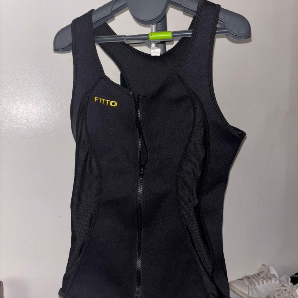 The Row Black waist trainer